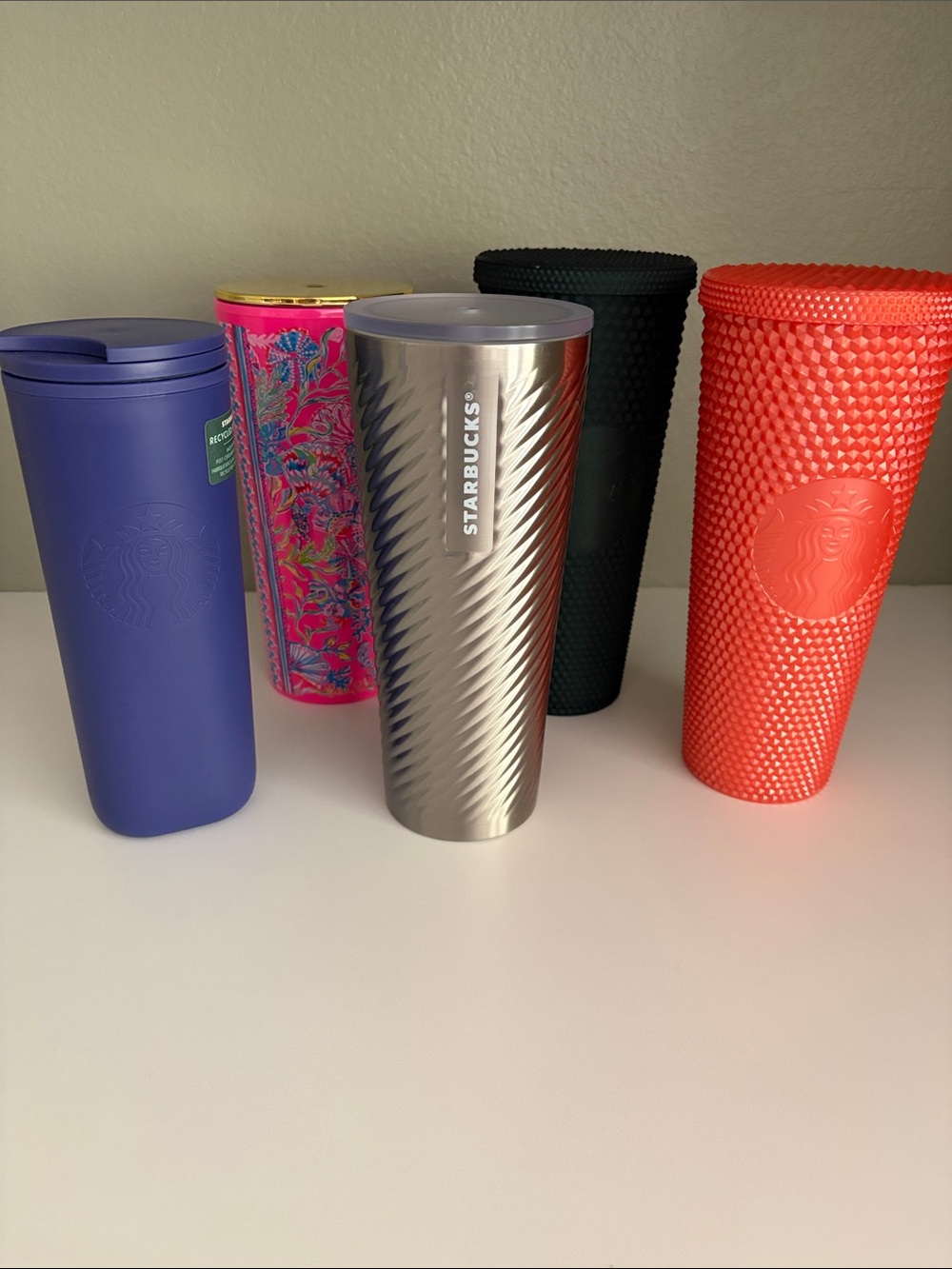 3 Starbucks Tumblers, 1 tumbler bottle and misc tumbler